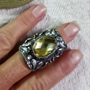 Silvertone large yellow stone decorative adjustable ring